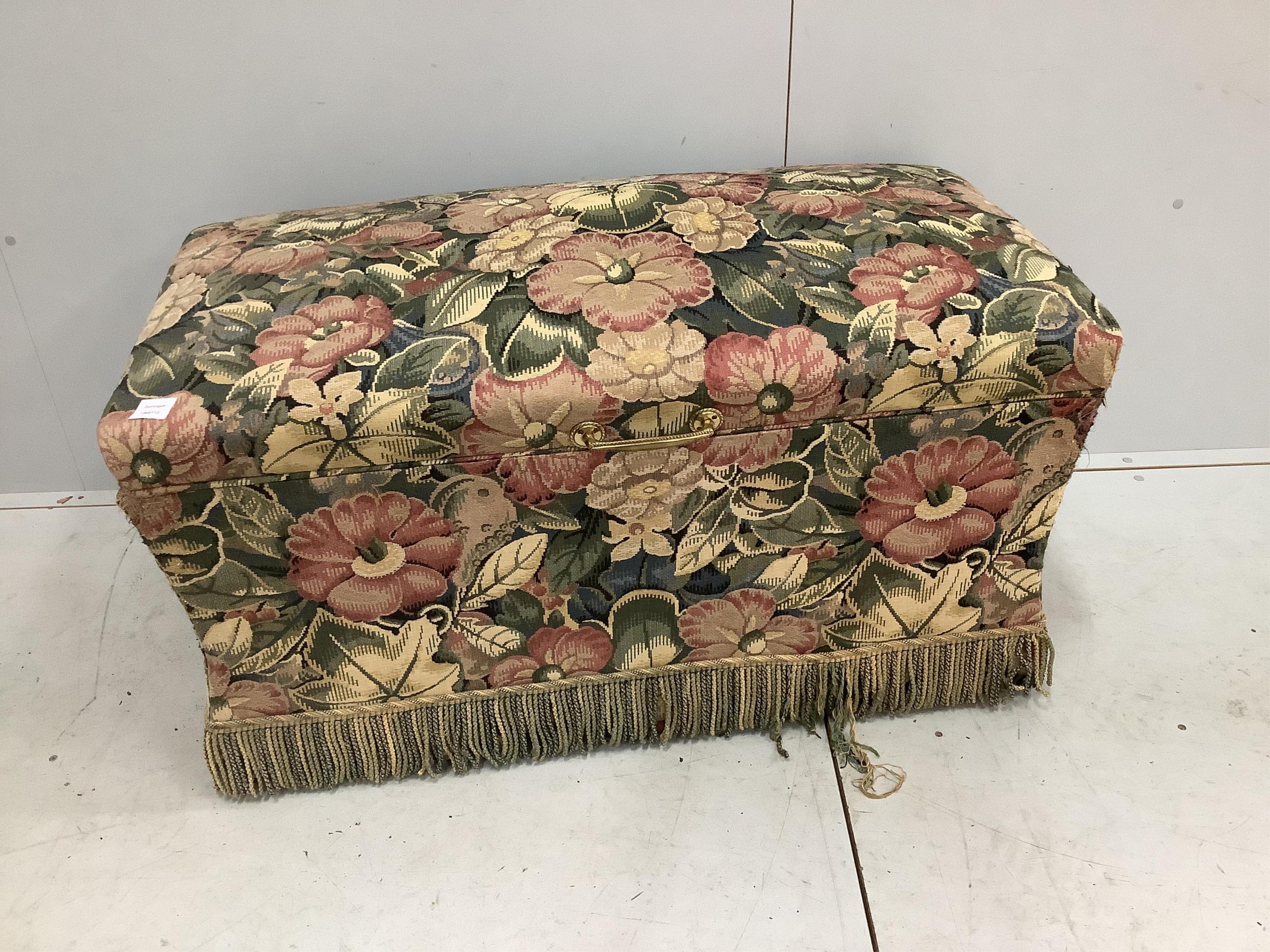 A floral upholstered box ottoman, with side carrying handles, width 110cm, depth 56cm, height 56cm. Condition - fair